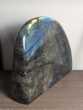 Polished Labradorite freeform crystal from Syn's Crystal Co showing iridescent flash, used for intuition, protection, and transformation.