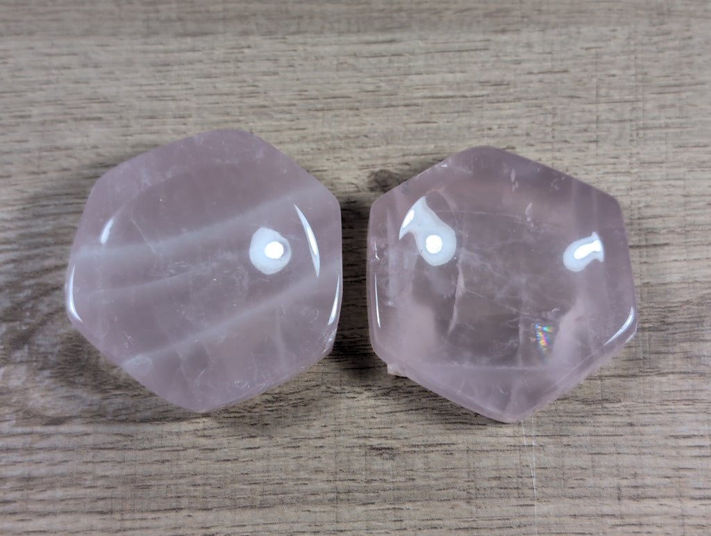 Hexagon-shaped rose quartz bowl from Syn's Crystal Co featuring smooth, pink crystal with natural stone patterns and polished surface.