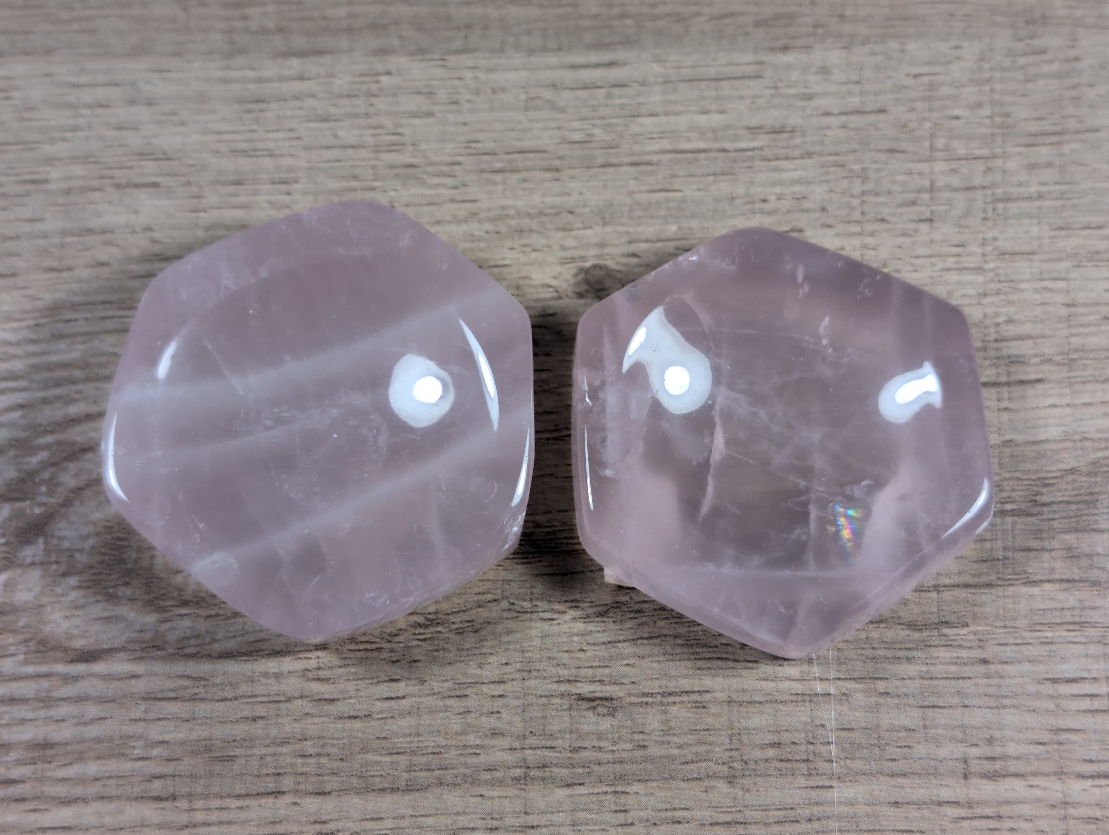 Hexagon-shaped rose quartz bowl from Syn's Crystal Co featuring smooth, pink crystal with natural stone patterns and polished surface.