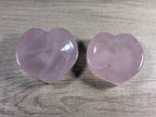 Heart-shaped rose quartz bowl from Syn's Crystal Co, showcasing a smooth, pink gemstone with a polished finish.