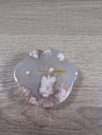 Flower Agate bowl with paw print and floral design, showcasing vibrant colors and intricate patterns, perfect for decorative display.