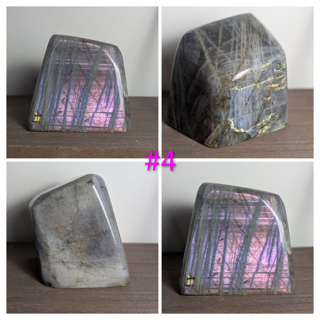 Polished Labradorite freeform crystal from Syn's Crystal Co showing iridescent flash and smooth, natural shape for intuition and protection.