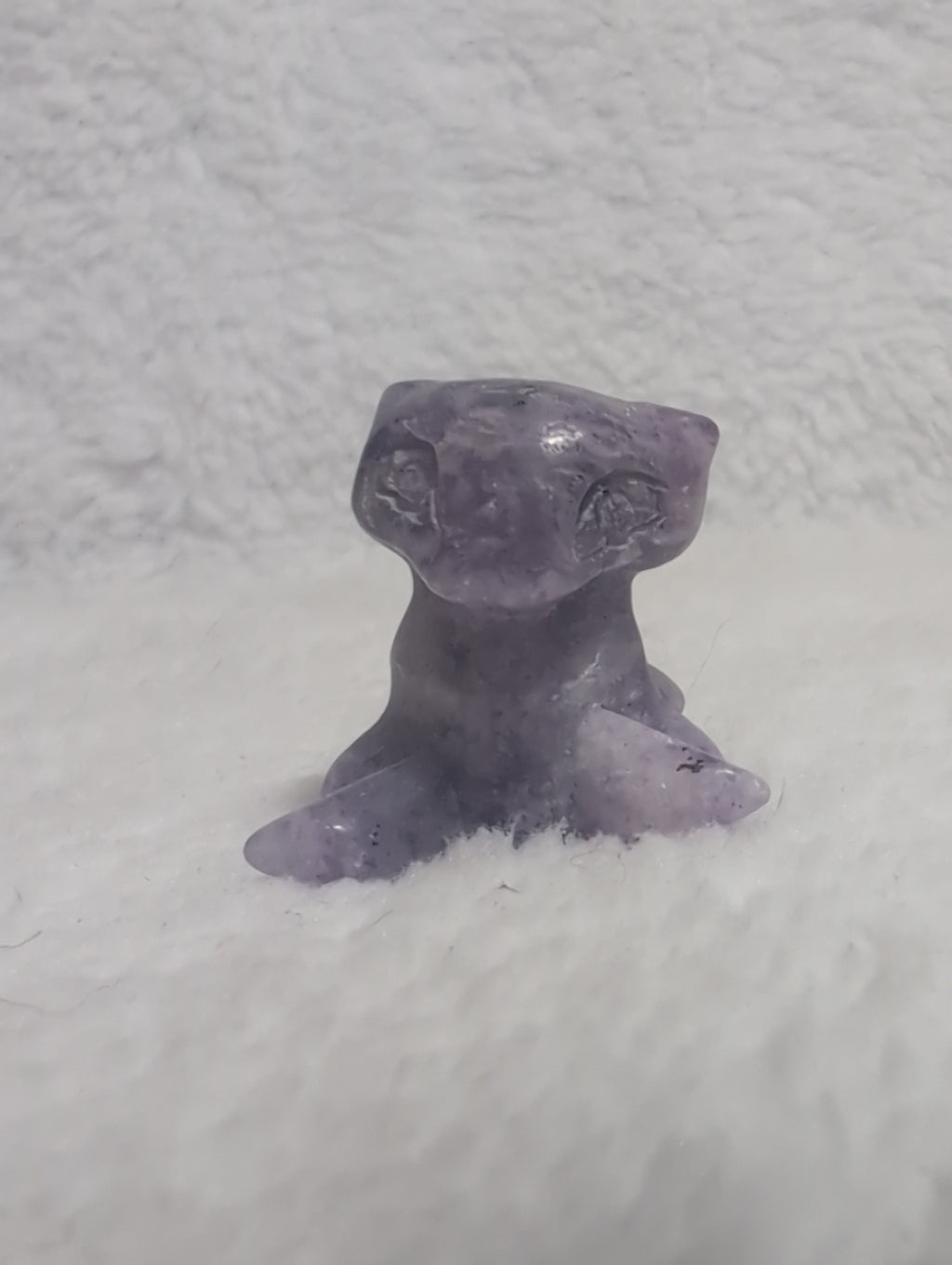 Mini Mew Pokemon carving from Syn's Crystal Co, featuring detailed crystal craftsmanship on a small, colorful figurine.