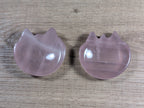 Pink rose quartz cat-shaped bowl with smooth, polished surface, showcasing the crystal's natural translucence and gentle curves.