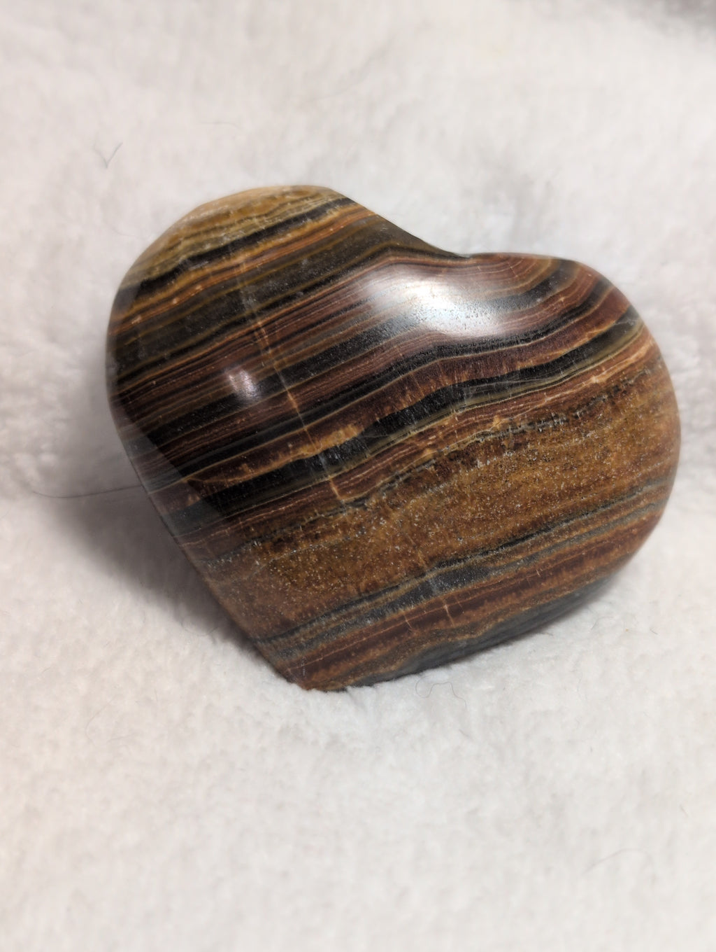 Pink Bumblebee Calcite heart-shaped crystal from Syn's Crystal Co with smooth polished surface and natural gemstone details.