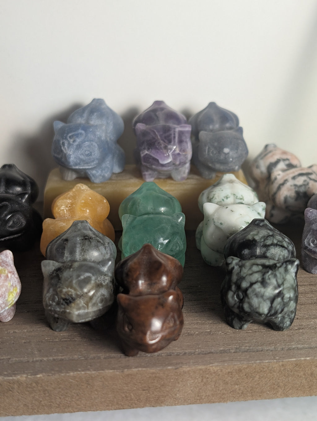 Hand-carved Bulbasaur crystal figurine by Syn's Crystal Co, gemstone carving representing nature and growth, perfect for chakra healing.
