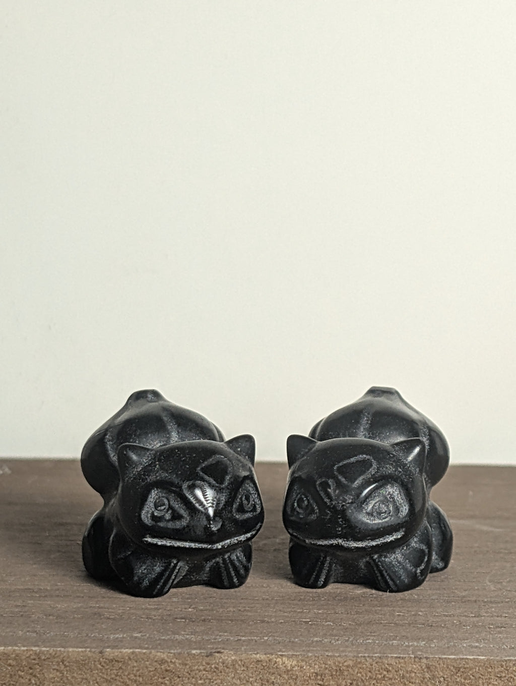 Hand-carved Bulbasaur crystal figurine by Syn's Crystal Co, featuring detailed gemstone craftsmanship perfect for nature and heart chakra.