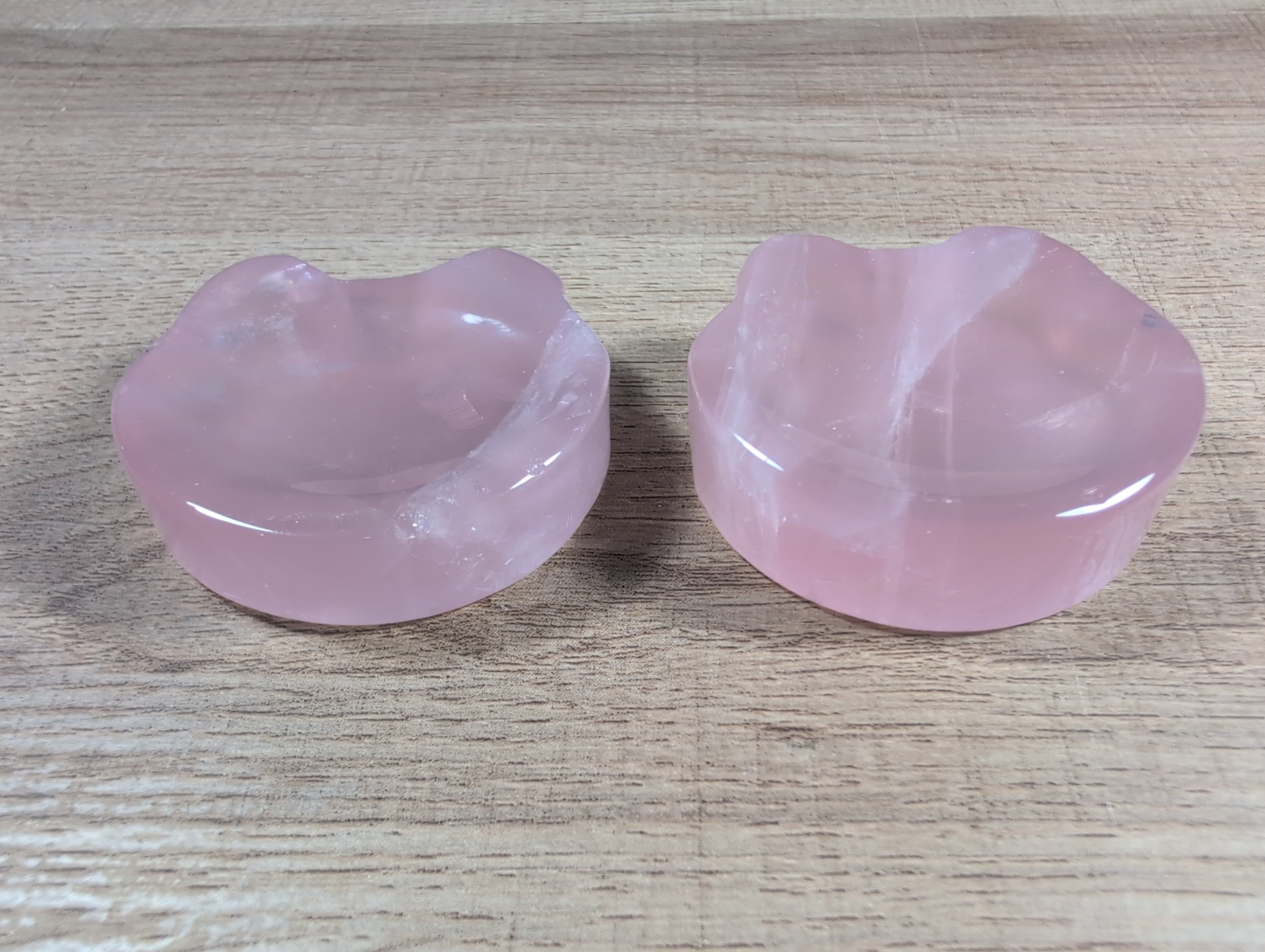 Rose quartz teddy bear head-shaped bowl from Syn's Crystal Co, featuring a smooth, polished pink gemstone with detailed bear facial features.