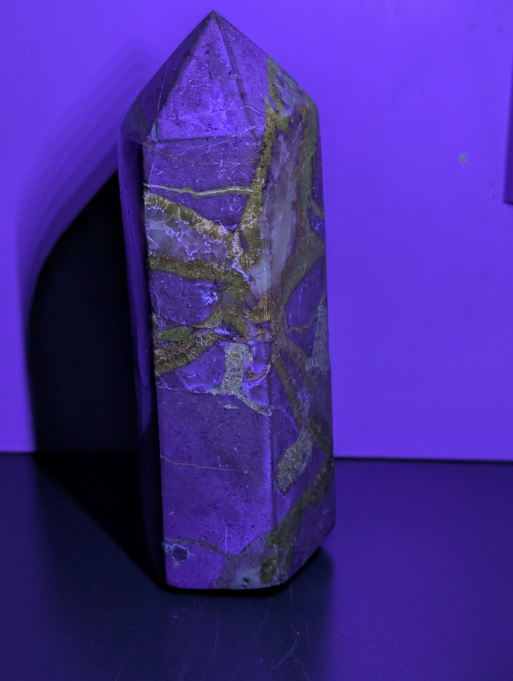 Septarian tower crystal from Syn's Crystal Co featuring earthy brown, yellow, and gray mineral patterns with a polished finish.