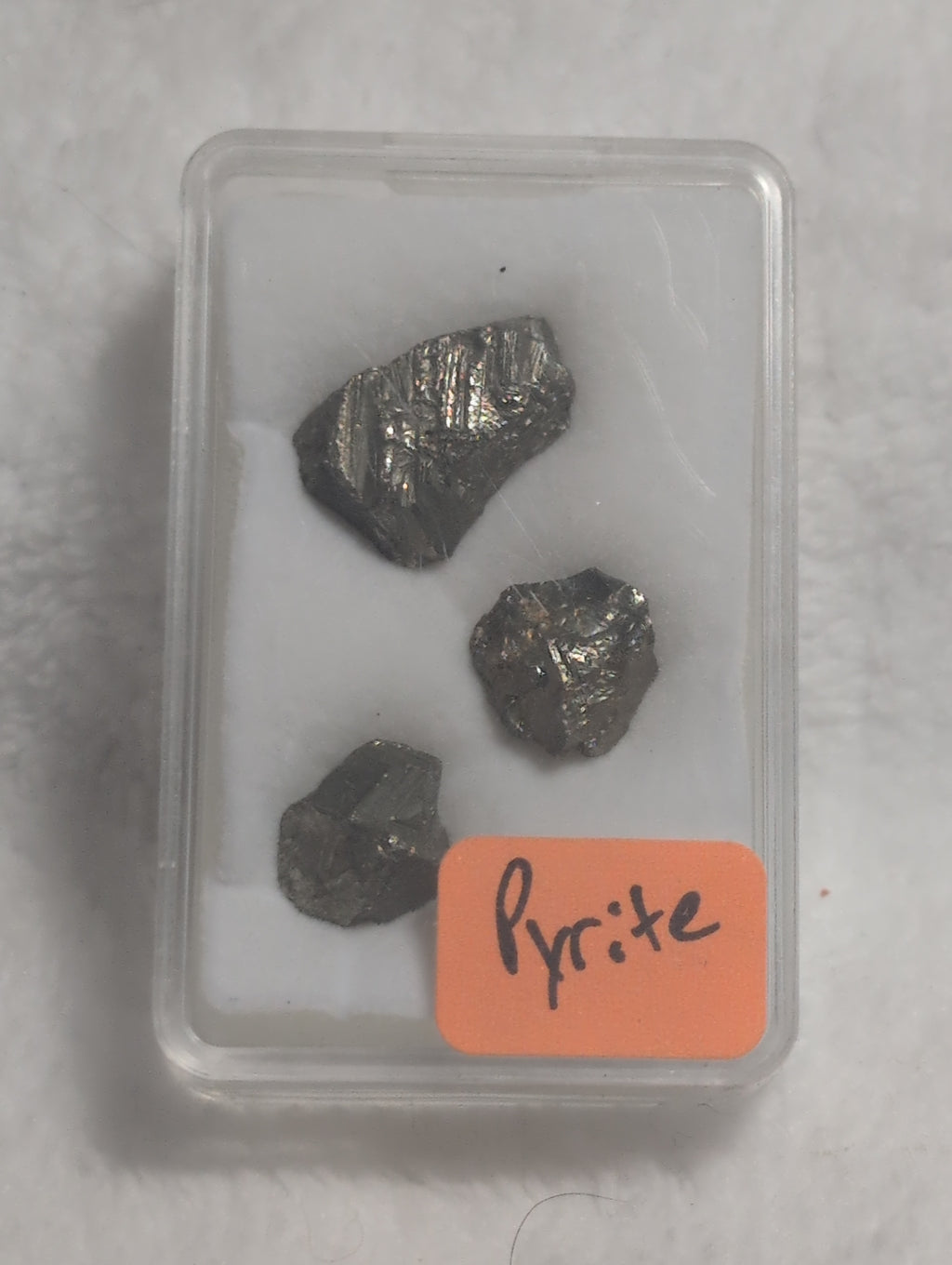 Small pyrite mineral specimen from Syn's Crystal Co showing metallic gold cubes and natural crystal formations.