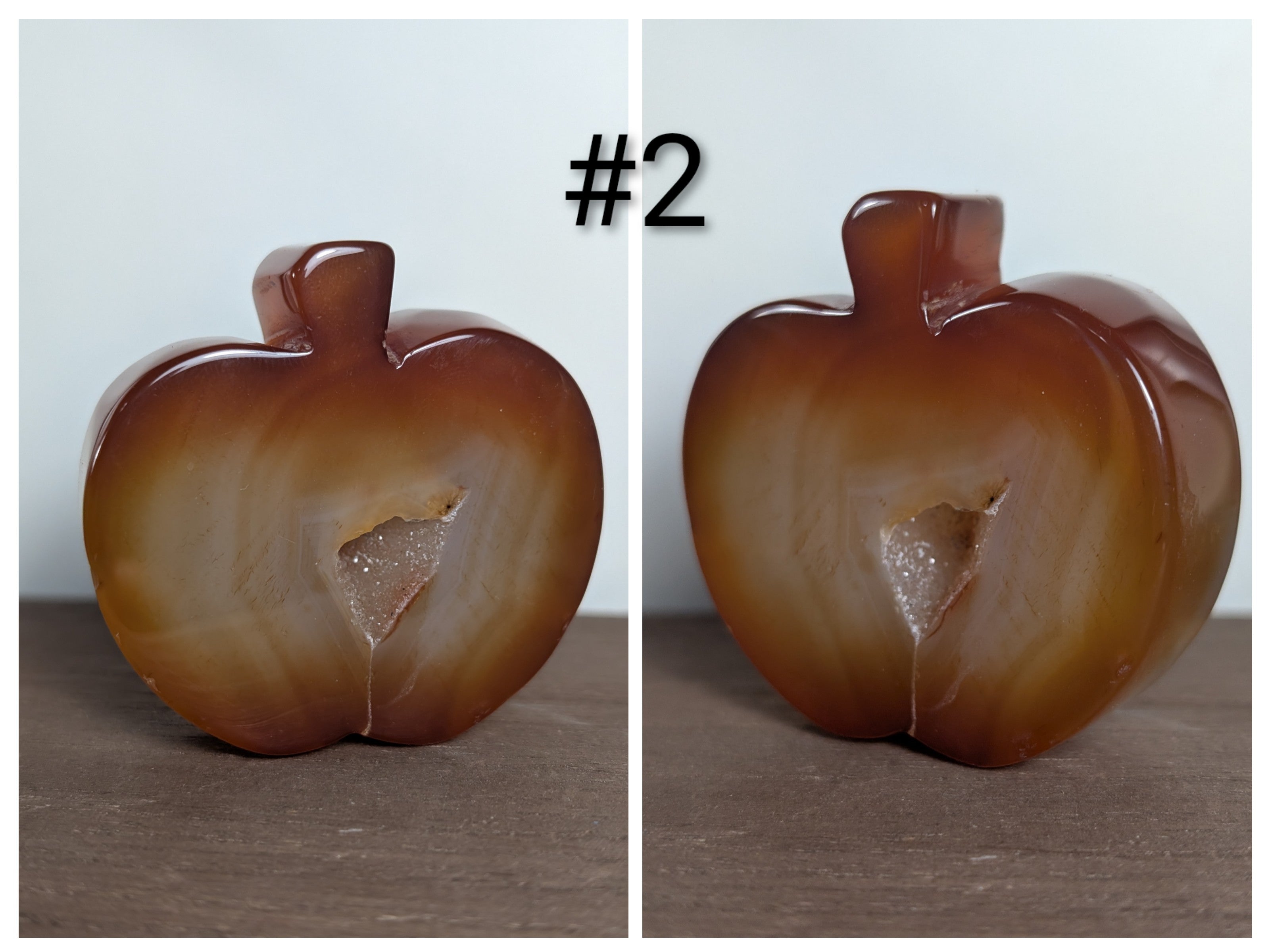 Hand-carved Carnelian Apple crystal sculpture from Syn's Crystal Co, featuring vibrant orange hues for creativity and abundance.