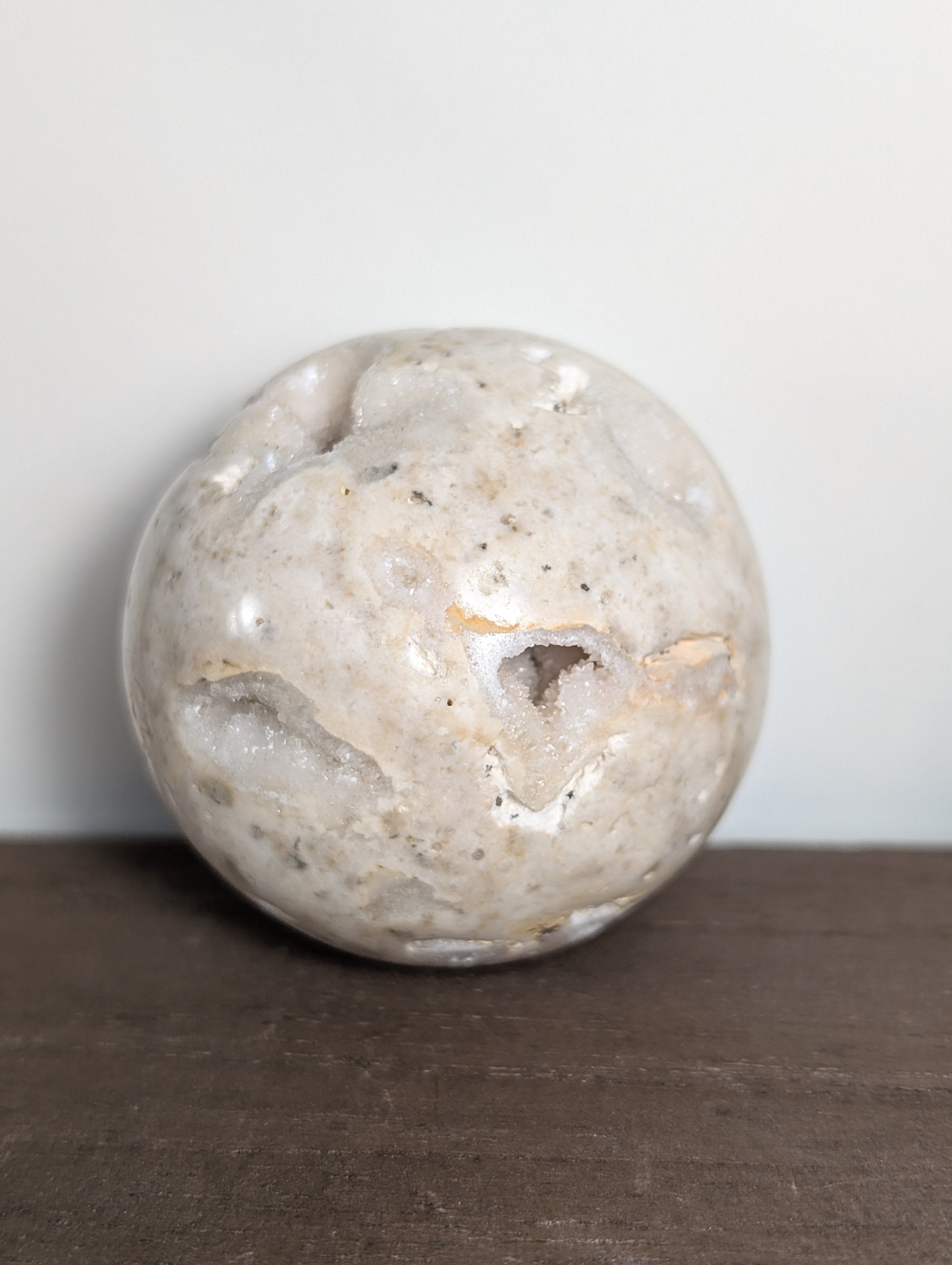 Shimmering purple Druzy Sphere gemstone from Syn's Crystal Co with sparkling crystalline surface and smooth rounded shape