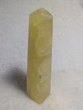 Lemon Calcite tower crystal from Syn's Crystal Co, showcasing vibrant yellow mineral with natural crystal formations.