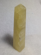 Lemon Calcite tower crystal from Syn's Crystal Co, showcasing vibrant yellow mineral with natural crystal formations.