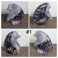 Syn's Crystal Co penguin carving sculpture showcasing a detailed, clear crystal penguin figurine on a smooth base.