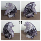 Syn's Crystal Co penguin carving sculpture showcasing a detailed, clear crystal penguin figurine on a smooth base.