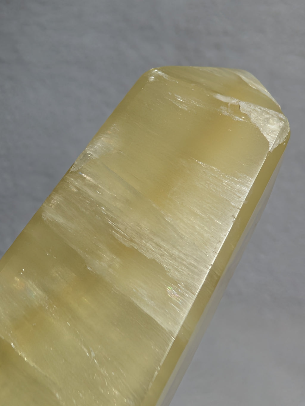 Lemon Calcite tower from Syn's Crystal Co, yellow crystal point for solar plexus chakra, confidence, motivation, and abundance.