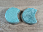 Half-moon shaped Amazonite bowl from Syn's Crystal Co, showcasing smooth polished blue-green stone with natural variations.
