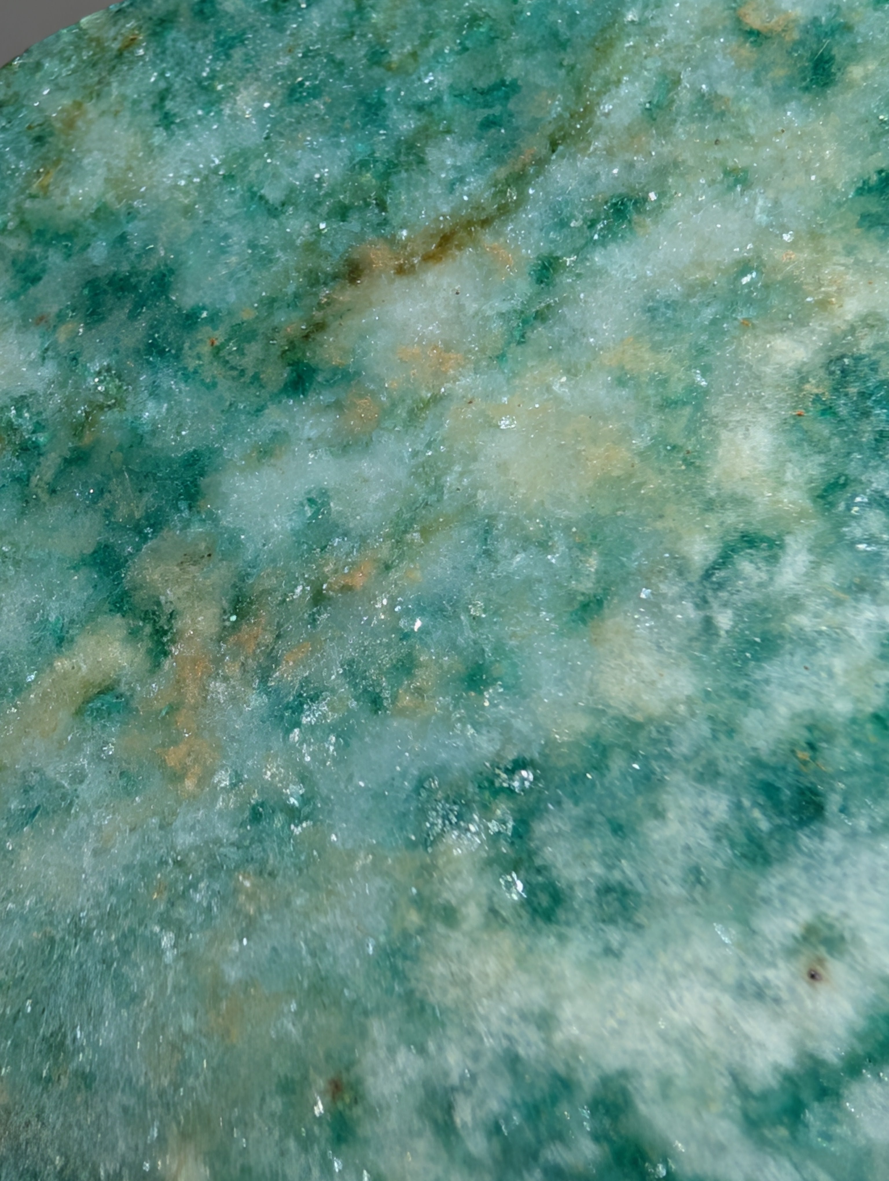 Green Aventurine Sun and Cloud carving by Syn's Crystal Co, featuring detailed sun and cloud shapes carved into green aventurine stone.