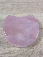 Shaped rose quartz bowl from Syn's Crystal Co, featuring smooth, polished pink quartz with a rounded, decorative design.