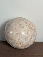 Druzy sphere gemstone from Syn's Crystal Co with sparkling crystal surface and natural mineral texture.