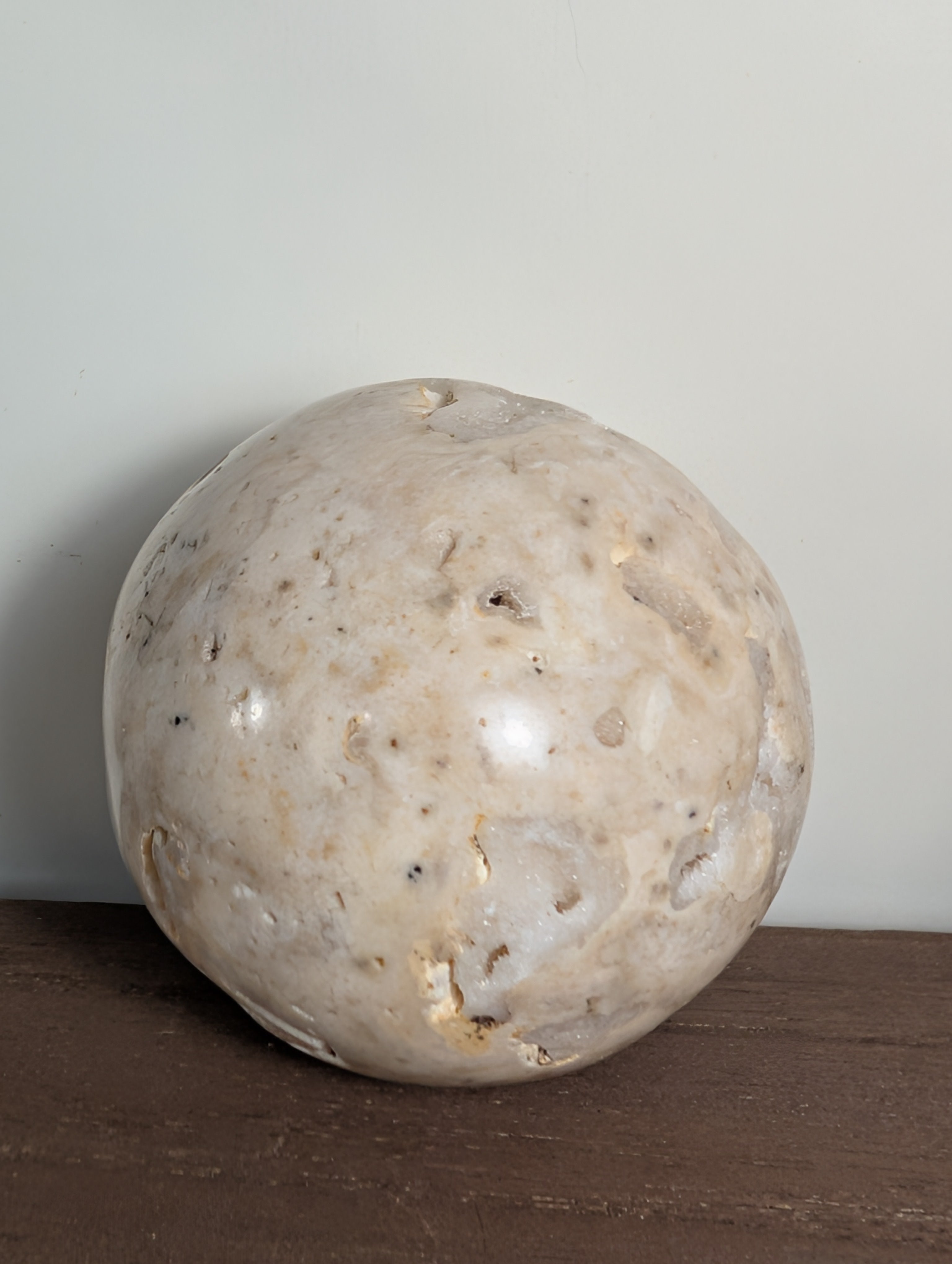 Druzy sphere gemstone from Syn's Crystal Co with sparkling crystal surface and natural mineral texture.