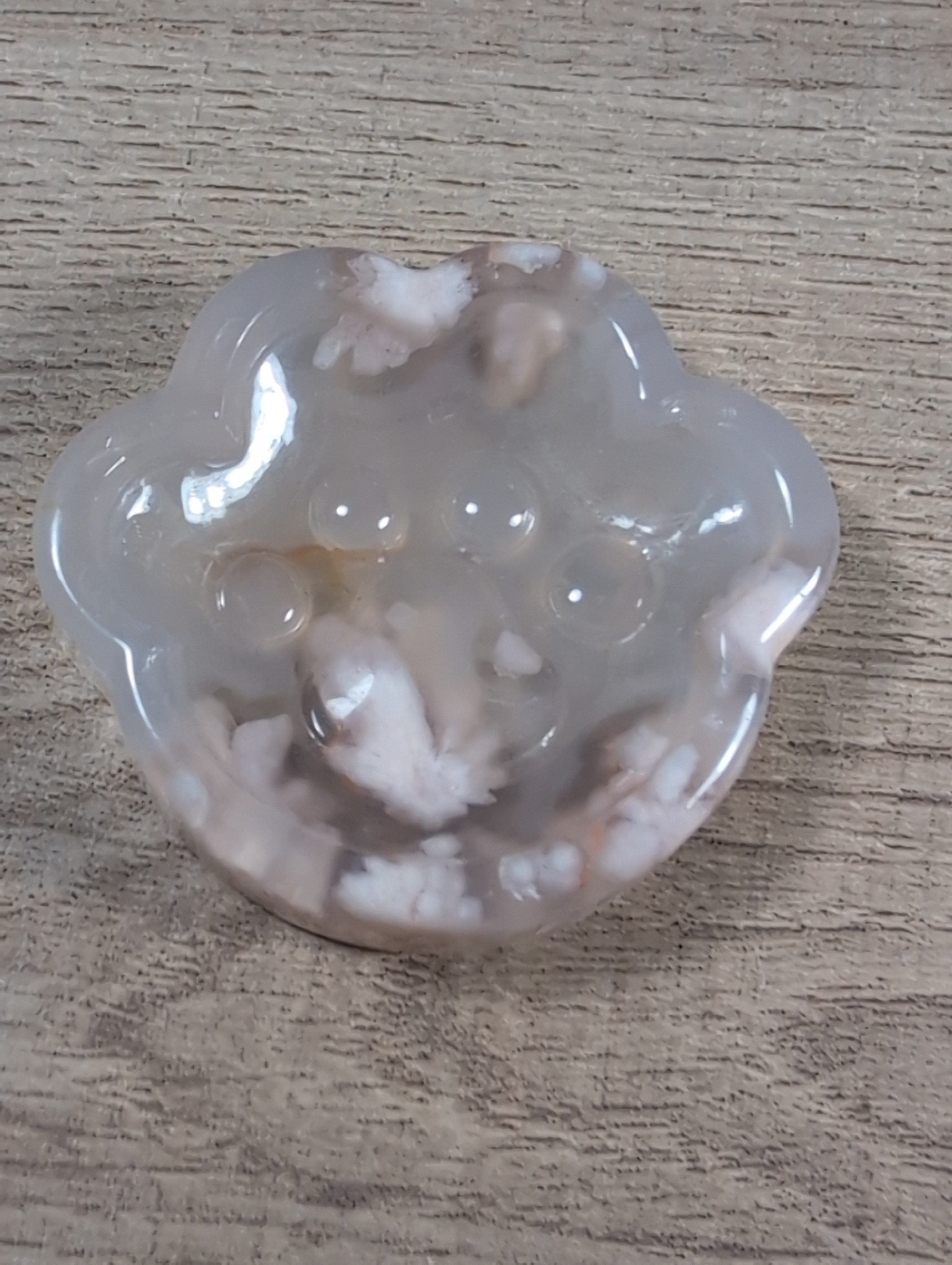 Flower agate bowl with paw print and flower designs, showcasing vibrant colors and intricate patterns from Syn's Crystal Co.