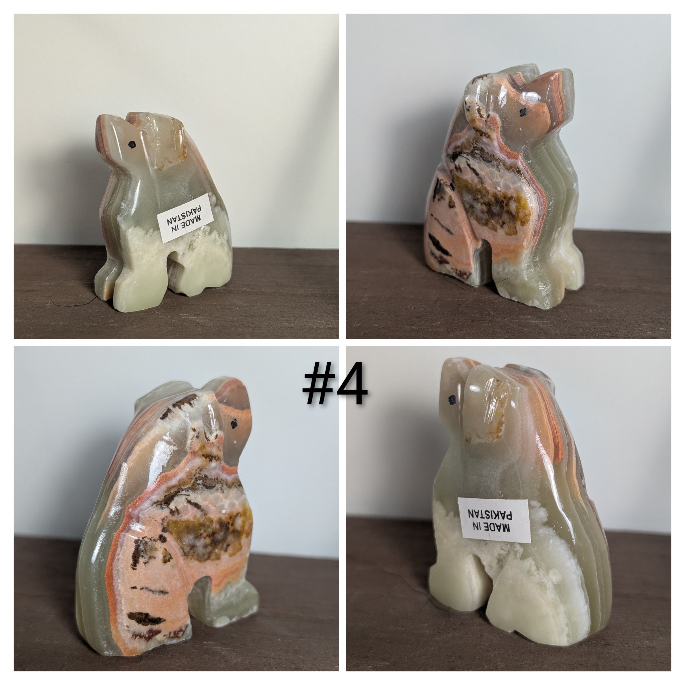 Handcarved wooden dog sculpture by Syn's Crystal Co, detailed dog carving with textured fur and expressive features.