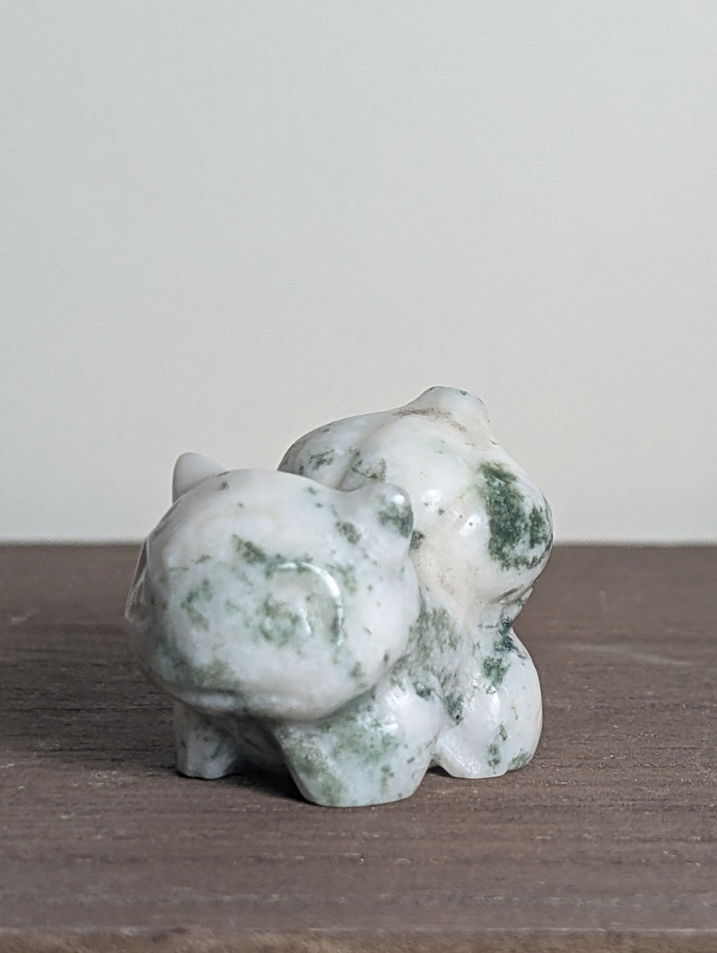 Hand-carved Bulbasaur gemstone figurine by Syn's Crystal Co, featuring detailed natural crystal carving for growth and heart chakra.