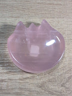 Cat-shaped rose quartz bowl with smooth pink crystal surface, designed by Syn's Crystal Co for decorative or spiritual use.
