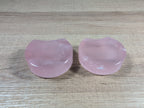 Shaped rose quartz bowl by Syn's Crystal Co, smooth polished pink gemstone with a rounded, decorative design for display or meditation.