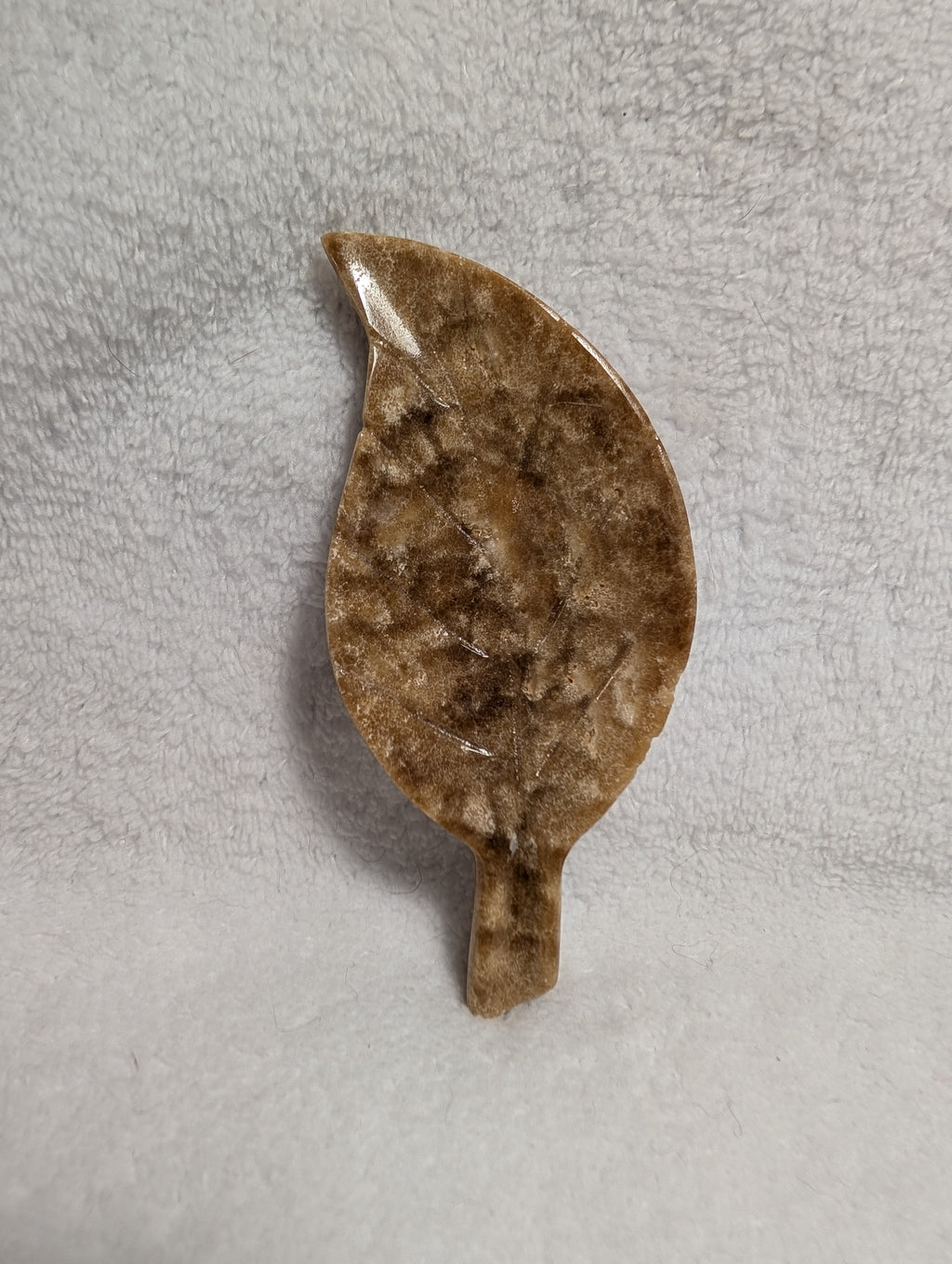 Chocolate Calcite Leaf crystal from Syn's Crystal Co, showcasing a polished brown calcite leaf with natural textures and rich color.