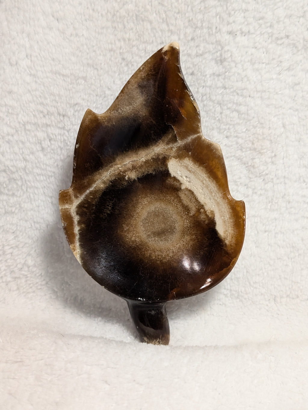 Chocolate Calcite Leaf crystal from Syn's Crystal Co, featuring a polished leaf-shaped chocolate-colored calcite specimen.