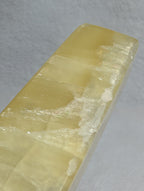 Lemon Calcite tower from Syn's Crystal Co, yellow crystal point for solar plexus chakra, confidence, motivation, and abundance.