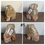 Handcarved wooden dog sculpture by Syn's Crystal Co, detailed dog carving with natural wood grain and intricate craftsmanship.