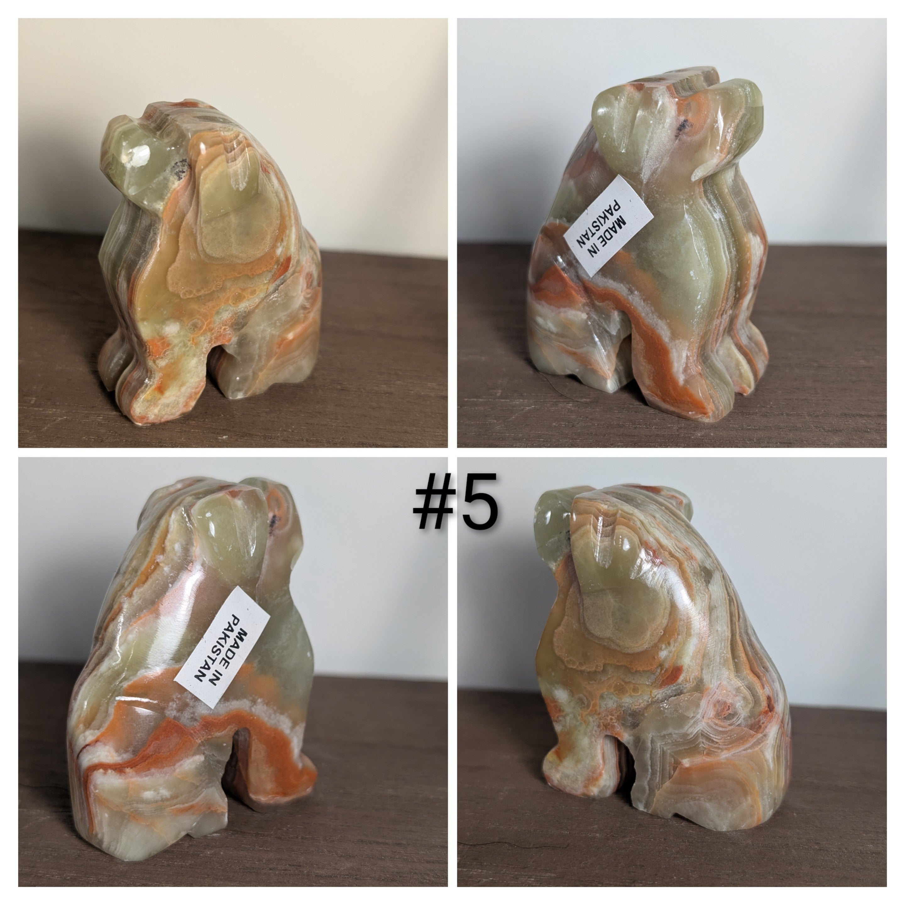 Handcarved wooden dog sculpture by Syn's Crystal Co, detailed dog carving with natural wood grain and intricate craftsmanship.