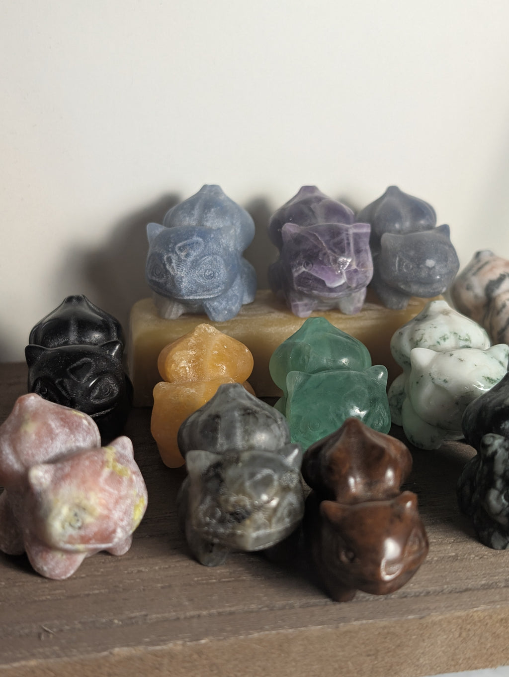 Hand-carved Bulbasaur gemstone figurine by Syn's Crystal Co, detailed crystal carving for growth, nature, and heart chakra symbolism.