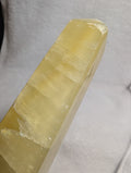 Lemon Calcite tower crystal from Syn's Crystal Co, yellow stone for solar plexus chakra, confidence, motivation, and abundance.