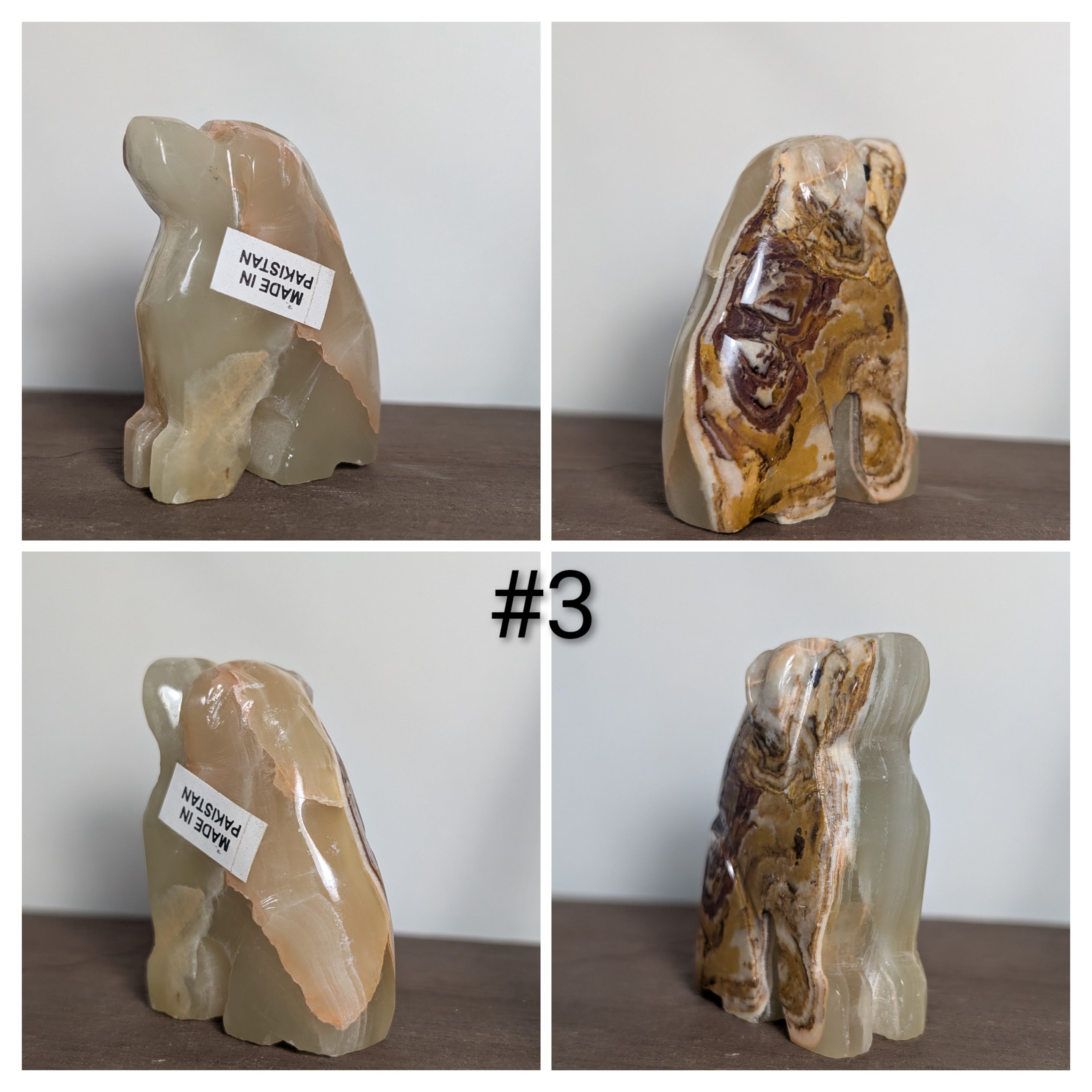 Handcarved wooden dog sculpture by Syn's Crystal Co, detailed craftsmanship showcasing a realistic dog figure.