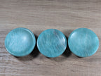 Round Amazonite bowl by Syn's Crystal Co featuring smooth, polished blue-green stone with natural veining and polished finish.