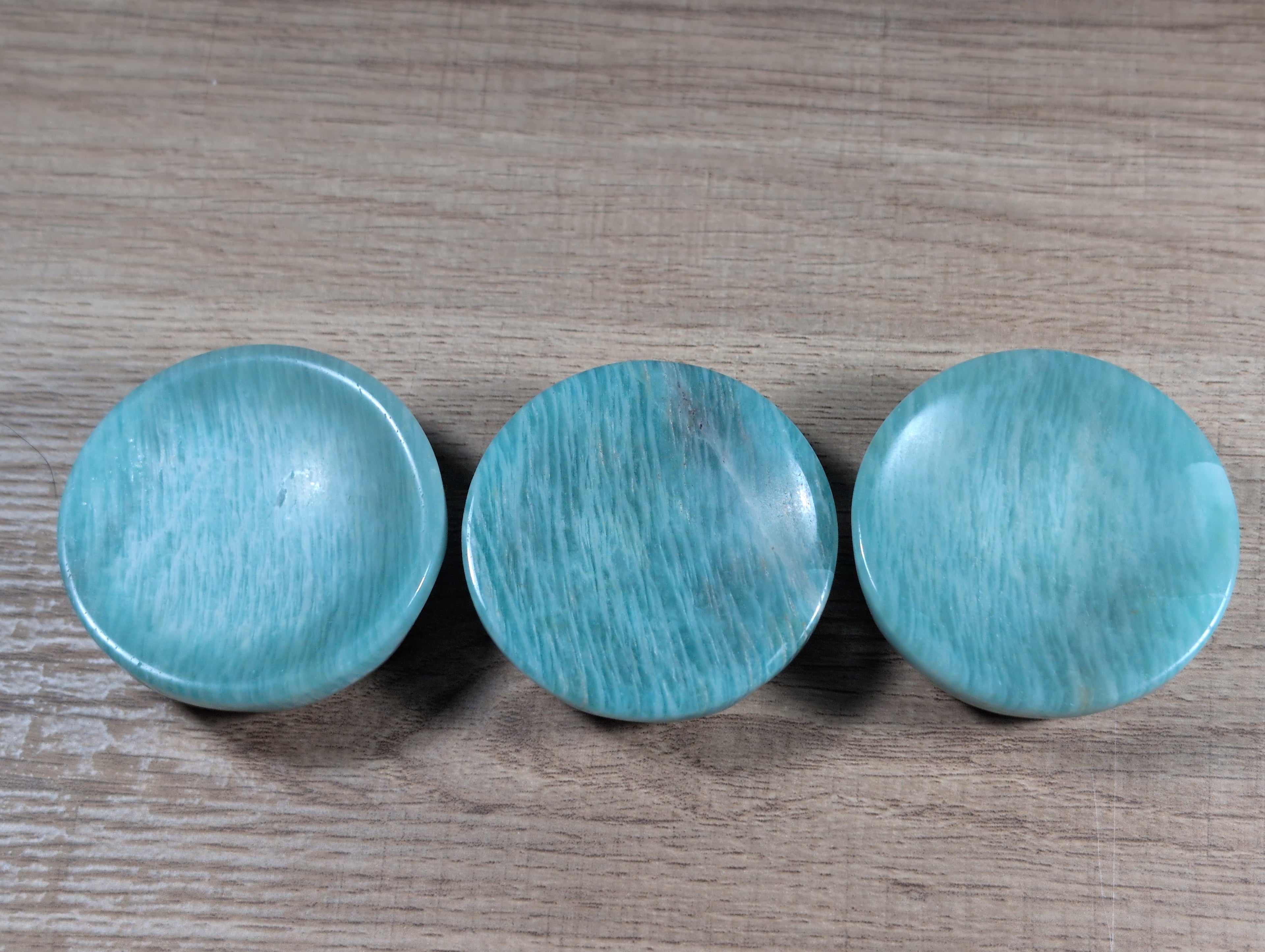 Round Amazonite bowl by Syn's Crystal Co featuring smooth, polished blue-green stone with natural veining and polished finish.