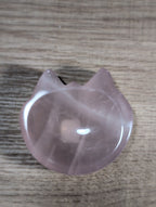 Pink rose quartz cat-shaped bowl from Syn's Crystal Co, smooth polished stone with a cute feline design.