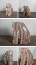 Handcarved dog sculpture by Syn's Crystal Co, detailed wooden dog carving with natural wood texture and craftsmanship.