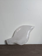 Silky white calcite leaf carving by Syn's Crystal Co, detailed natural stone sculpture with intricate leaf design.