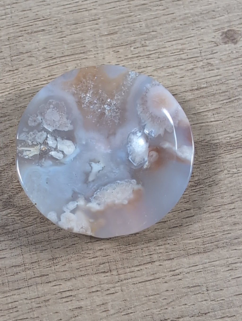 Round Flower Agate bowl from Syn's Crystal Co, showcasing vibrant flower patterns and smooth polished surface.