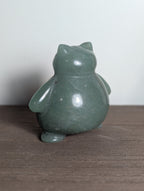 Syn's Crystal Co Snorlax carving, detailed crystal sculpture of the popular Pokémon character, showcasing craftsmanship and artistry.