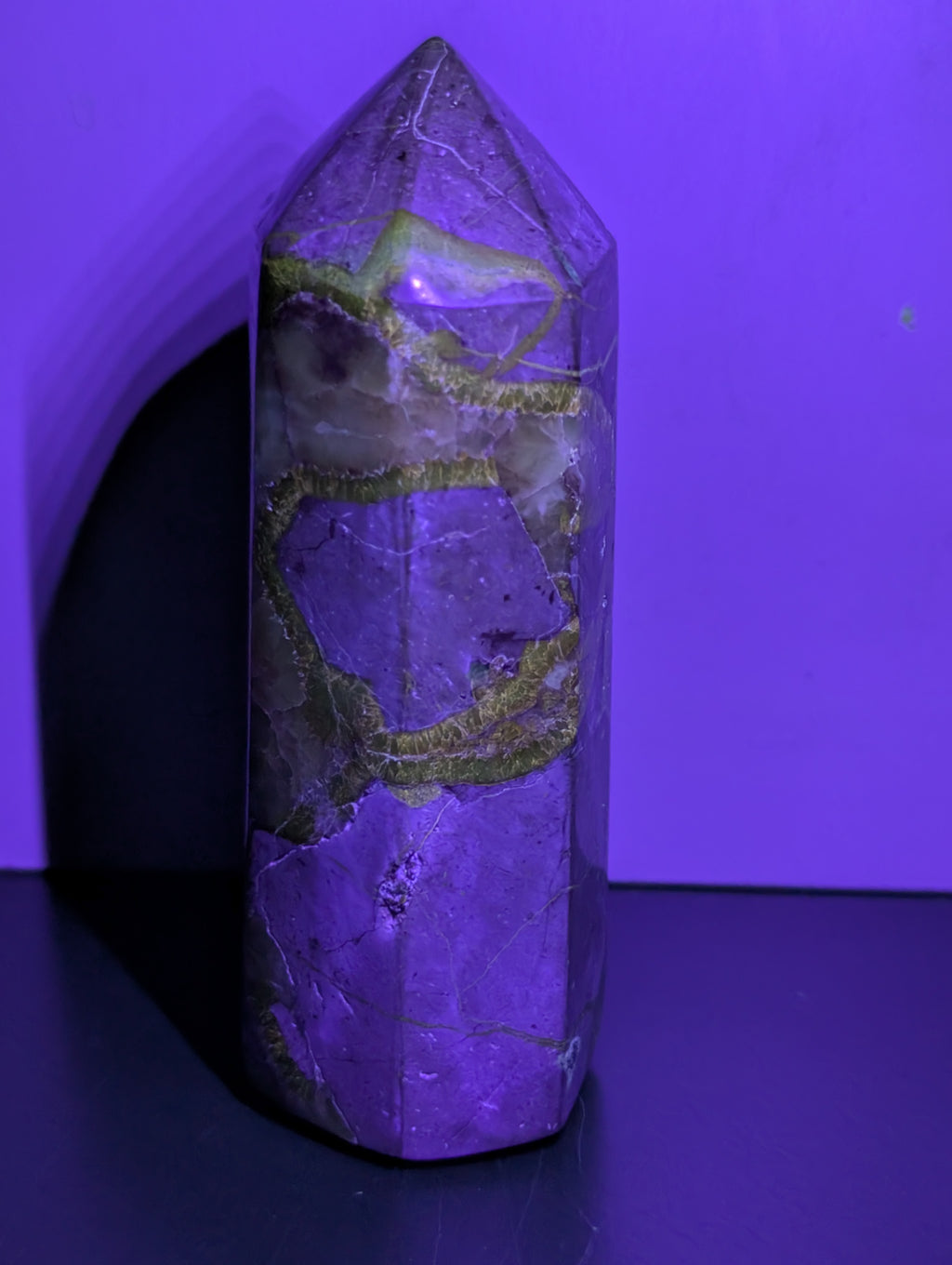 Septarian tower crystal from Syn's Crystal Co showing a natural brown and yellow mineral formation with unique patterns and textures.