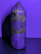 Septarian tower crystal from Syn's Crystal Co showing a natural brown and yellow mineral formation with unique patterns and textures.