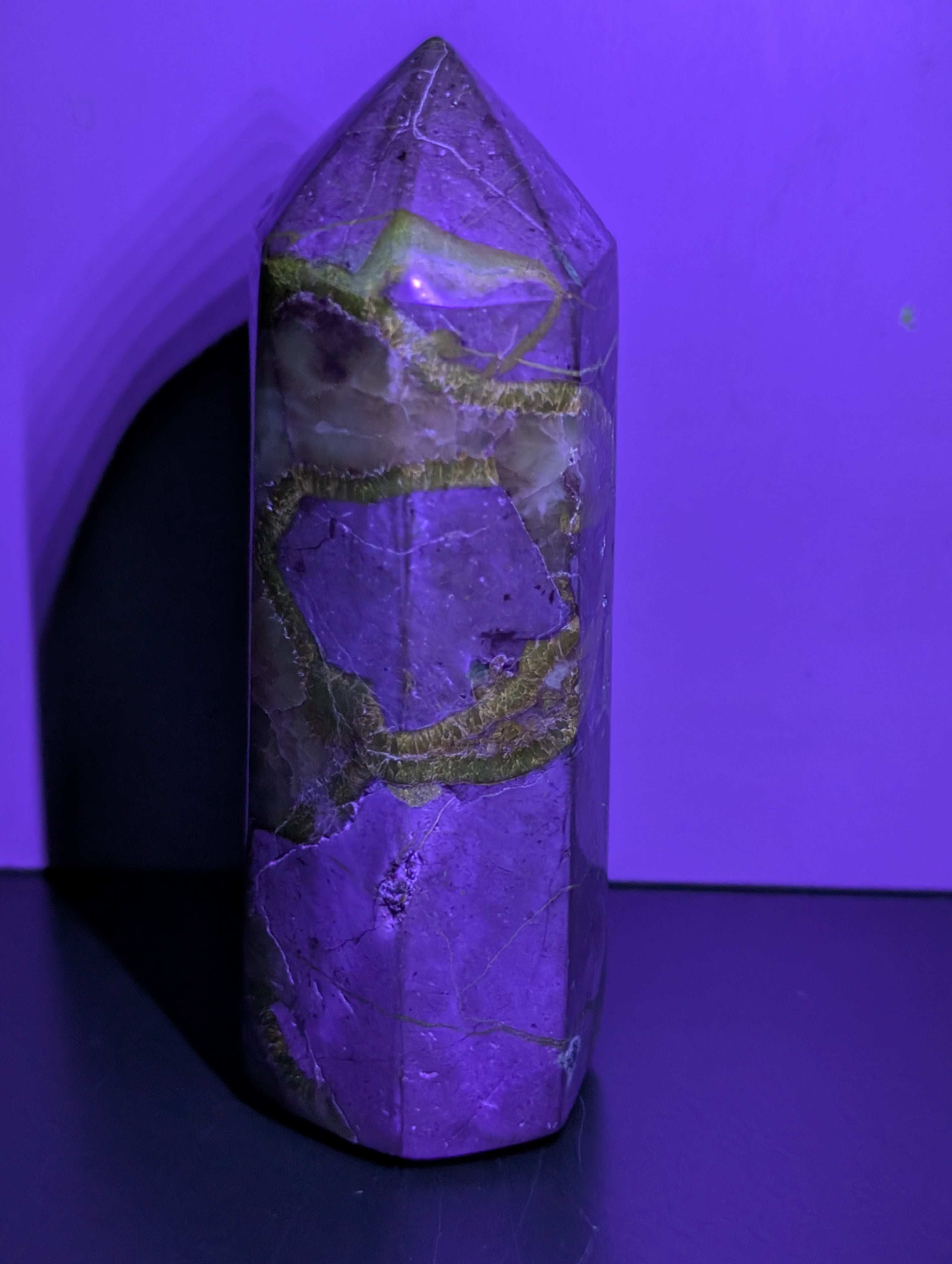 Septarian tower crystal from Syn's Crystal Co showing a natural brown and yellow mineral formation with unique patterns and textures.