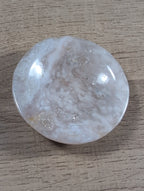 Round flower agate bowl by Syn's Crystal Co featuring vibrant, polished flower agate with natural banding and smooth, rounded edges.